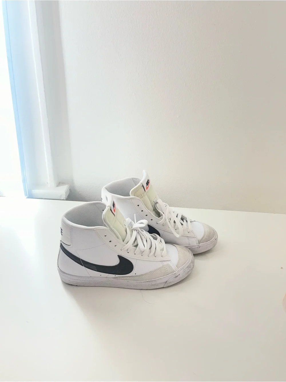 Nike Kids White High-Top Sneakers with Black Swoosh